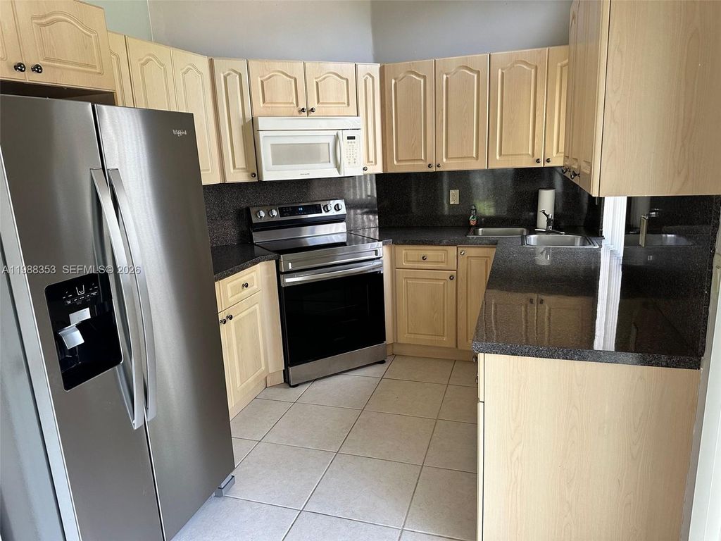 Photo of 1367 Seagrape Cir #1367, Weston, FL 33326 (MLS # A11988353)