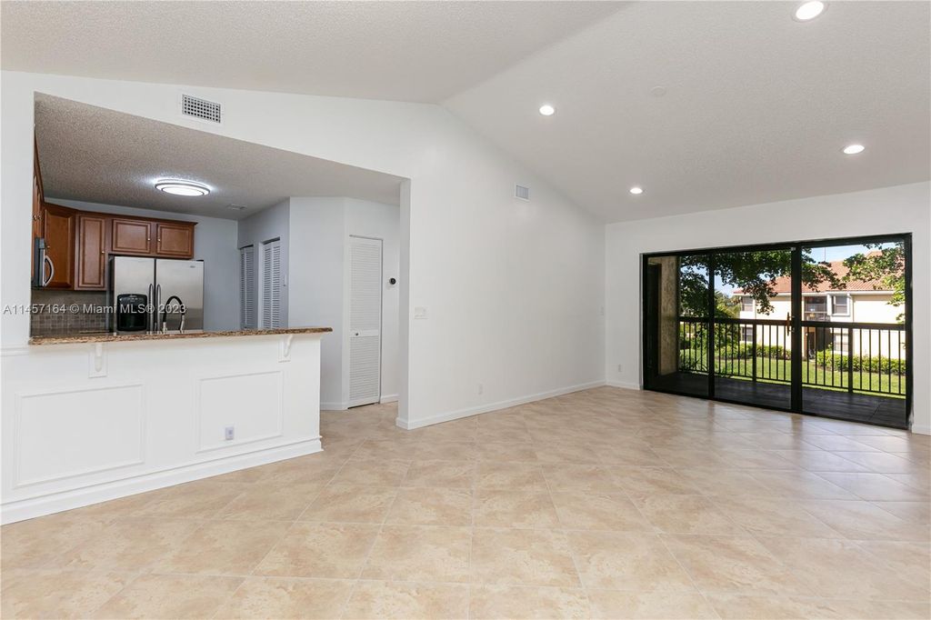 Photo of 5741 Riverside Dr #205A5, Coral Springs, FL 33067 (MLS # A11457164)