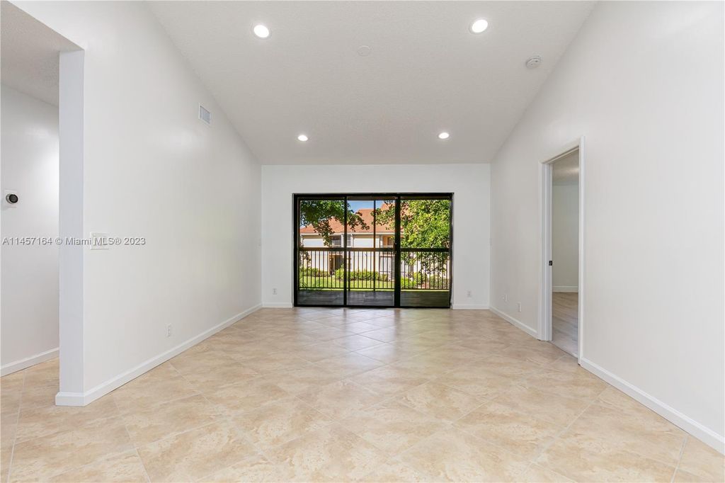 Photo of 5741 Riverside Dr #205A5, Coral Springs, FL 33067 (MLS # A11457164)