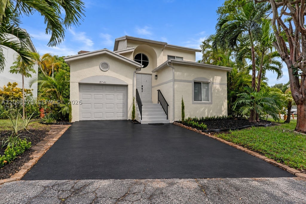 Photo of 8741 SW 10th St, Pembroke Pines, FL 33025 (MLS # A12094271)