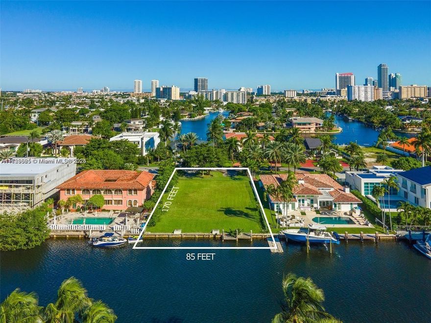 Build your dream waterfront estate on this prime lot in the exclusive, gated Golden Isles community. Boasting 85 feet of deep-water frontage, wide canal views, and direct ocean access with no fixed bridges, this is a boater’s dream come true. Situated in a highly desirable and rapidly growing luxury neighborhood, this lot offers finished architectural plans for those ready to start building. Enjoy a quick cruise through the Intracoastal to the ocean via Bal Harbour/Haulover cut. Perfectly positioned between Miami and Fort Lauderdale, with easy access to international airports and minutes from Bal Harbour, Aventura, and Sunny Isles. This is South Florida luxury living at its finest!