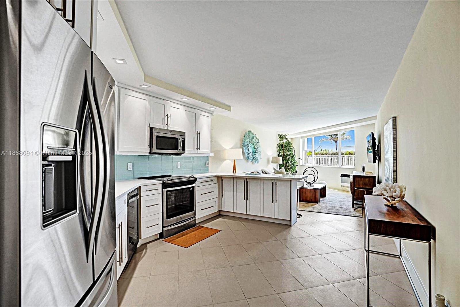 LOCATION: Right on the beach, just step out your front door right onto the beach. Enjoy beautiful Sunset & Sunrise views. This beautifully undated Unit is features 2 bright/spacious bedrooms & 1.5 updated bathrooms w/ step in shower. Large Open recently updated concept kitchen features SS appliances, Beautiful porcelain tile throughout Quartz Countertop Impact Windows & front Door & Accordion shutters. 40 year inspection passed. Low HOA. No current assessments. Unit is located on the 1st floor with parking spot right in front of the unit. Common Laundry on 1st floor. Heated Pool. Rent 1x lifetime. No pets.