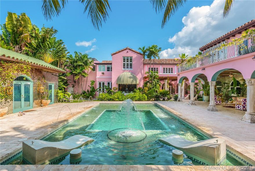 This classic Mediterranean Revival estate was meticulously restored and updated by Ximena Caminos, as her personal refuge and escape. A contemporary beach design compliments accents such as a grand fireplace and custom wall murals. Original details include wrought iron, elaborate stonework, and pecky cypress inside and out. There is a gourmet chefs kitchen with breakfast room and butler pantry, as well as 7 bedrooms, all with ensuite baths. The exterior has an extraordinary custom pool and spa with elaborate water features and various outdoor entertaining areas including a large pergola with lush foliage and a poolside dining loggia. The house is located on a double lot on Miami Beach iconic Pine Tree Drive.