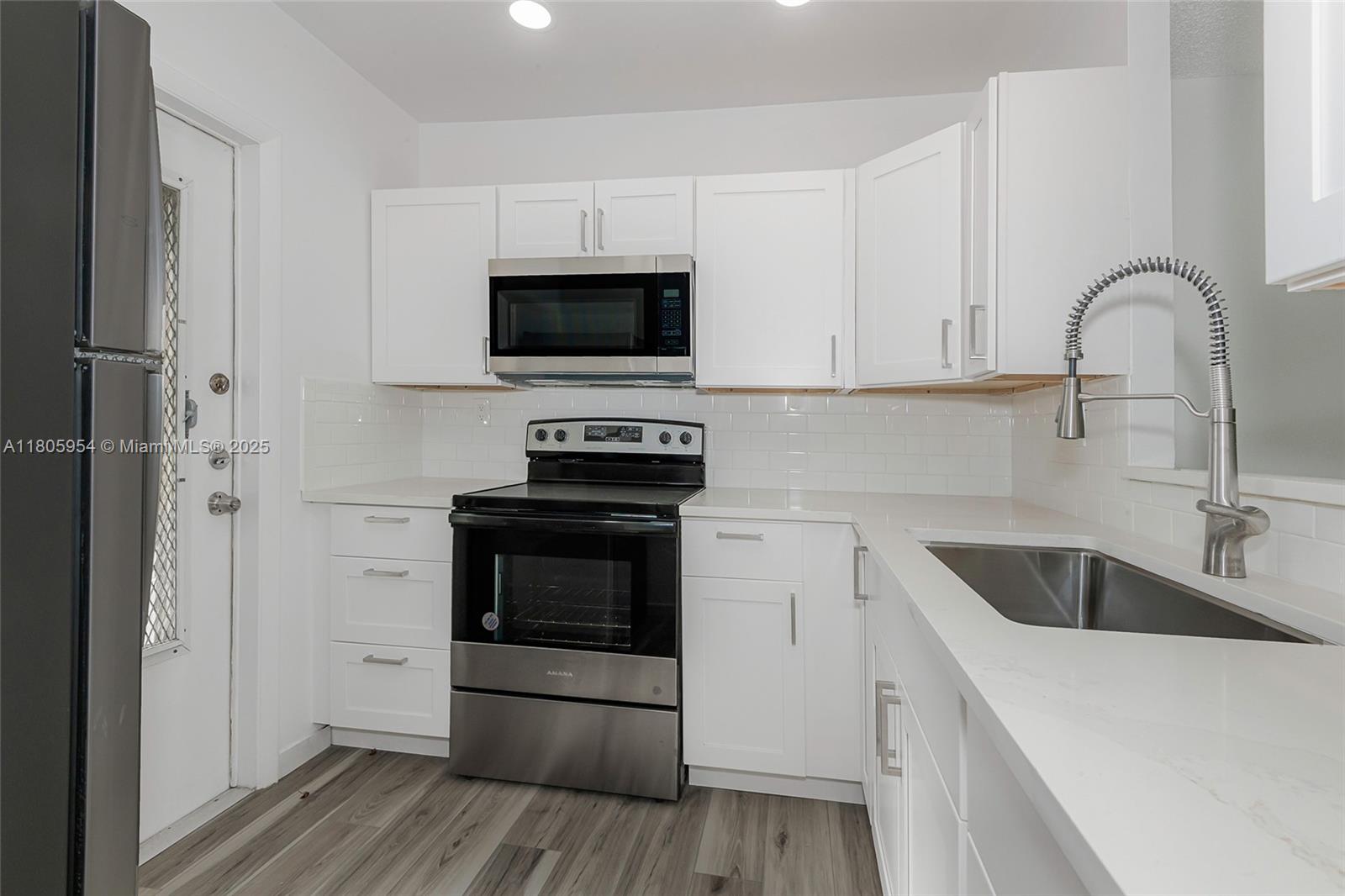 MELALEUCA GARDENS CONDO - Residential