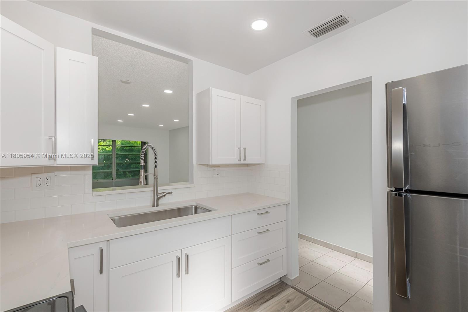 MELALEUCA GARDENS CONDO - Residential