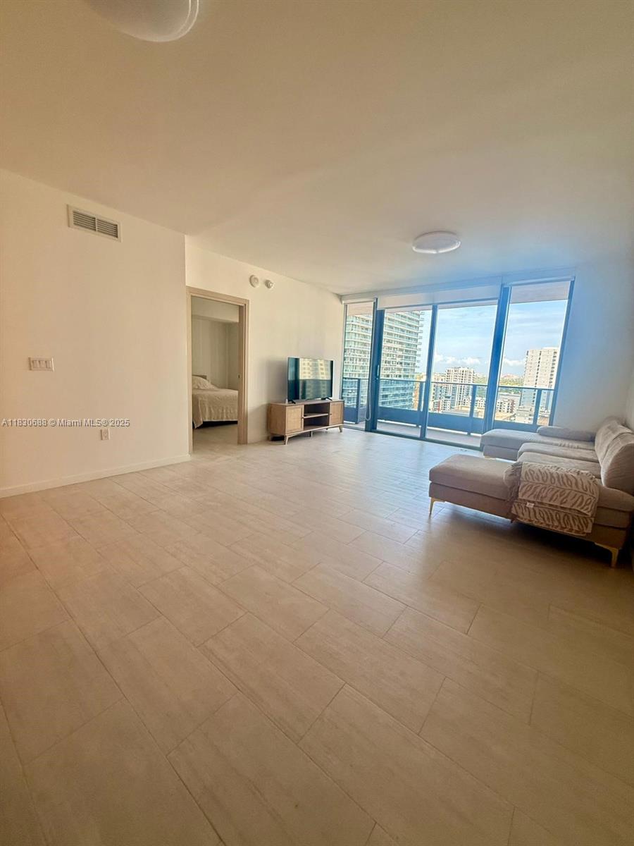 Experience luxury living at Flatiron Brickell in this elegant 1-bed, 1.5-bath residence with stunning city views. The open-concept layout features floor-to-ceiling windows, flooding the space with natural light. Enjoy a sleek kitchen with premium Miele appliances and a spa-like master bath with dual vanity, soaking tub, and separate shower. Residents have access to world-class amenities including a rooftop pool, sundeck, fitness center, and spa. Perfectly located in the heart of Brickell, just steps from Brickell City Centre, Mary Brickell Village, fine dining, and entertainment.