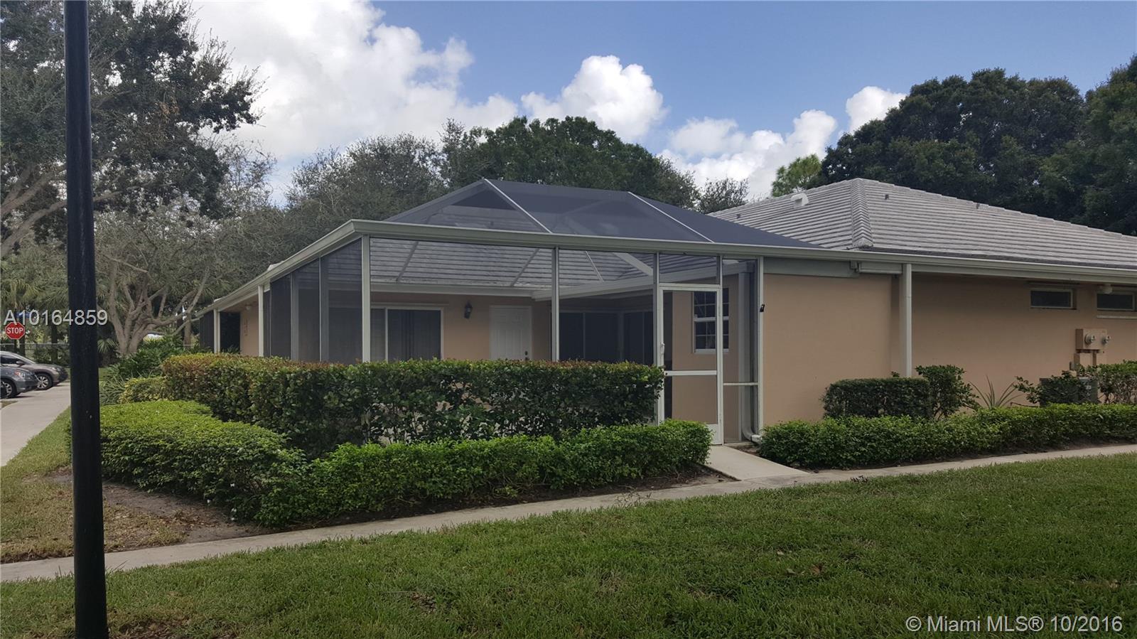 Very desirable community of Lake Catherine. Two bedroom, 2 bath. Spacious throughout with vaulted ceilings, screened patio, storage closet. Just minutes from I-95, Turnpike, and the Gardens Mall.