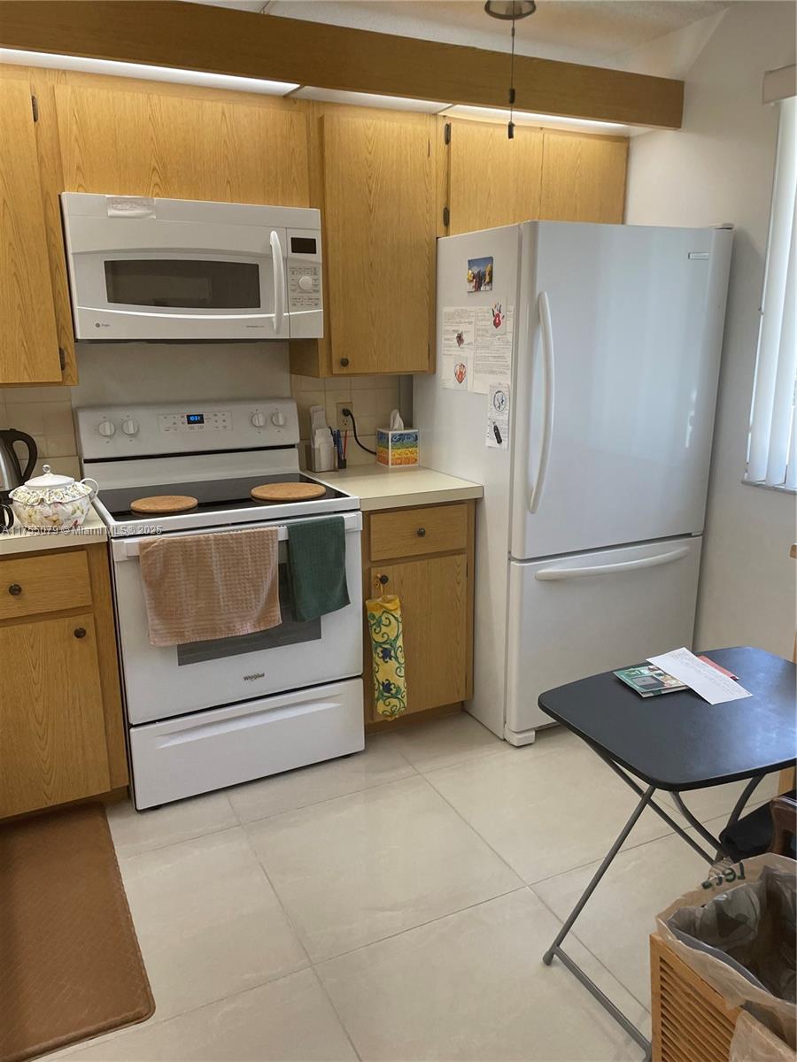 Centrally located and beautiful updated 2-bedroom, 2 bathroom condo, walk in closet in master bedroom in the heart of Boca Raton. Spacious laundry and storage room. Extremely clean and well maintained home with lots of natural sunlight and garden and water views from the living room and master! Two spacious balconies. Brand news kitchen appliances and washer and dryer.