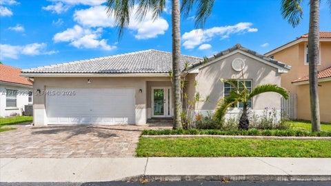 Photo of 1010 NW 125th Ave, Sunrise, FL 33323 (MLS # A12103295)
