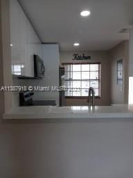 Photo 13 of 38 of 12078 SW 140th Ter 3-21 townhome