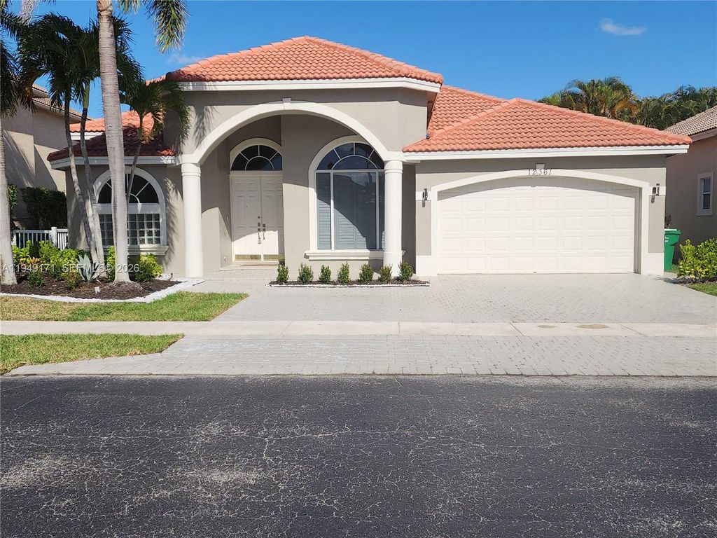 Photo of 12361 NW 26th St, Coral Springs, FL 33065 (MLS # A11949171)
