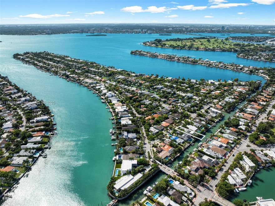 Beautifully renovated one-story waterfront home located in the guard-gated community of Biscayne Point. This 3-bedroom, 3.5-bath residence offers ocean access with no fixed bridges, a covered patio, and a stunning pool surrounded by lush landscaping. Inside, the home features a sleek chef’s kitchen with Jenn-Air and Wolf appliances and an open-concept layout designed for modern living. The spacious primary suite includes direct access to the backyard. Designed with indoor-outdoor entertaining in mind, this turnkey property is the perfect blend of style, function, and Miami Beach waterfront living—just minutes from the beach, Bal Harbour, and world-class dining and shopping.