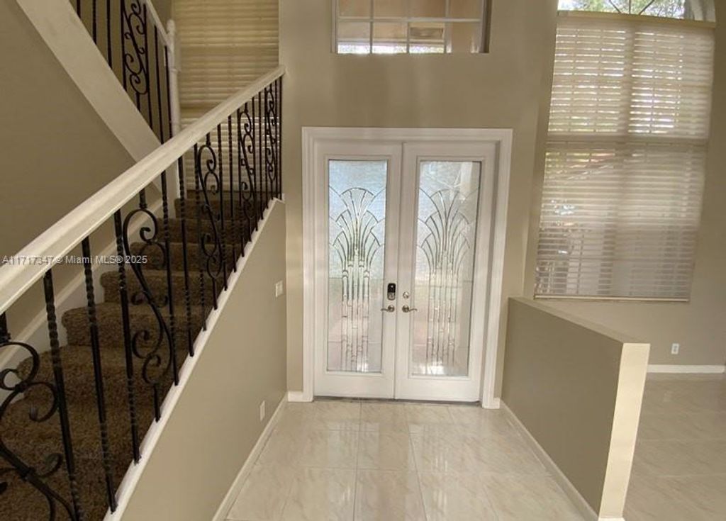 Photo of 6020 NW 61st Mnr, Parkland, FL 33067 (MLS # A11717347)