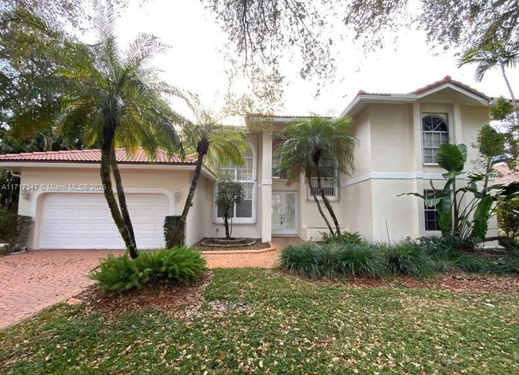Photo of 6020 NW 61st Mnr, Parkland, FL 33067 (MLS # A11717347)