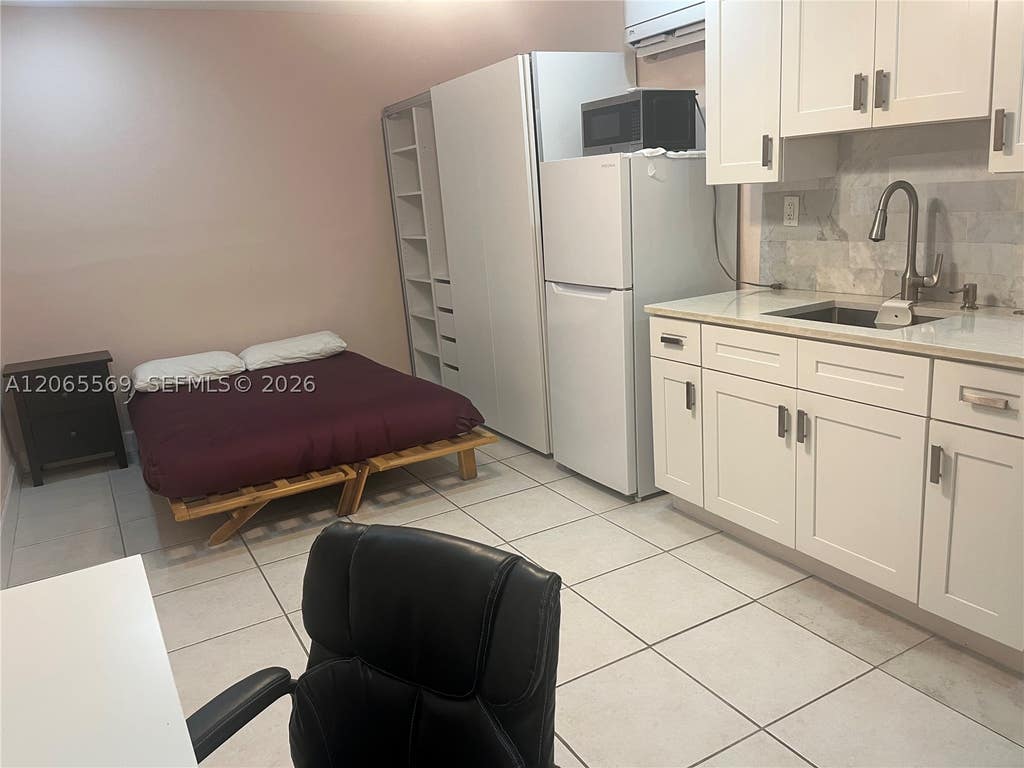 Photo of 1111 NW 79th Way #0, Pembroke Pines, FL 33024 (MLS # A12065569)