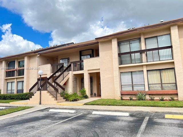 ENJOY THIS FIRST FLOOR 2 BEDROOM 2 BATHROOM UNIT IN MEADOWRIDGE. PORCELAIN FLOORS IN KITCHEN , LIVING AND DINING AREA. LAMINATED FLOORS ON BEDROOMS. MASTER BEDROOM OFFERS A SPACIOUS WALKING CLOSET.WASHER AND DRYER INSIDE UNIT. LARGE ENCLOSED PATIO WITH NICE VIEW OF GARDEN. PRIME LOCATION JUST SOUTH OF I-95 AND CLOSE TO SHOPPING CENTERS AND DINING PLACES. NO ASSESSMENTS AND 40 YEAR INSPECTION PASSED. UNIT IS VACANT AND EASY TO SHOW.