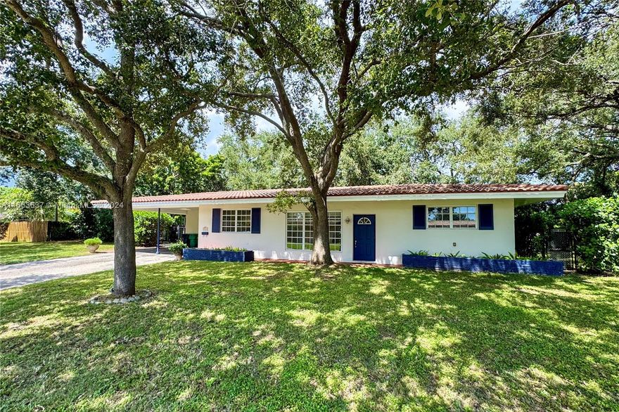 This charming home, near the sought-after Village of Pinecrest, offers a peaceful retreat with a spacious, shaded backyard perfect for relaxation or family fun. Explore the treehouse and zip line, or unwind in a hammock under the mature trees. The bright kitchen features stainless-steel appliances, ample storage, and a serene view of the lush backyard. The open living area is ideal for cozy family gatherings or entertaining guests. A bonus room, currently used as an office, provides flexibility for work, hobbies, or extra storage. Meticulously maintained, this home is ready for your personal touch. Conveniently located near top schools, parks, and shopping, it combines the charm of suburban living with easy access to city amenities. Perfect for families seeking both space and tranquility.