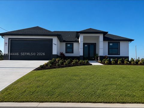Photo of 1144 Ecstasy ST E, Lehigh Acres, FL 33974 (MLS # A12034446)