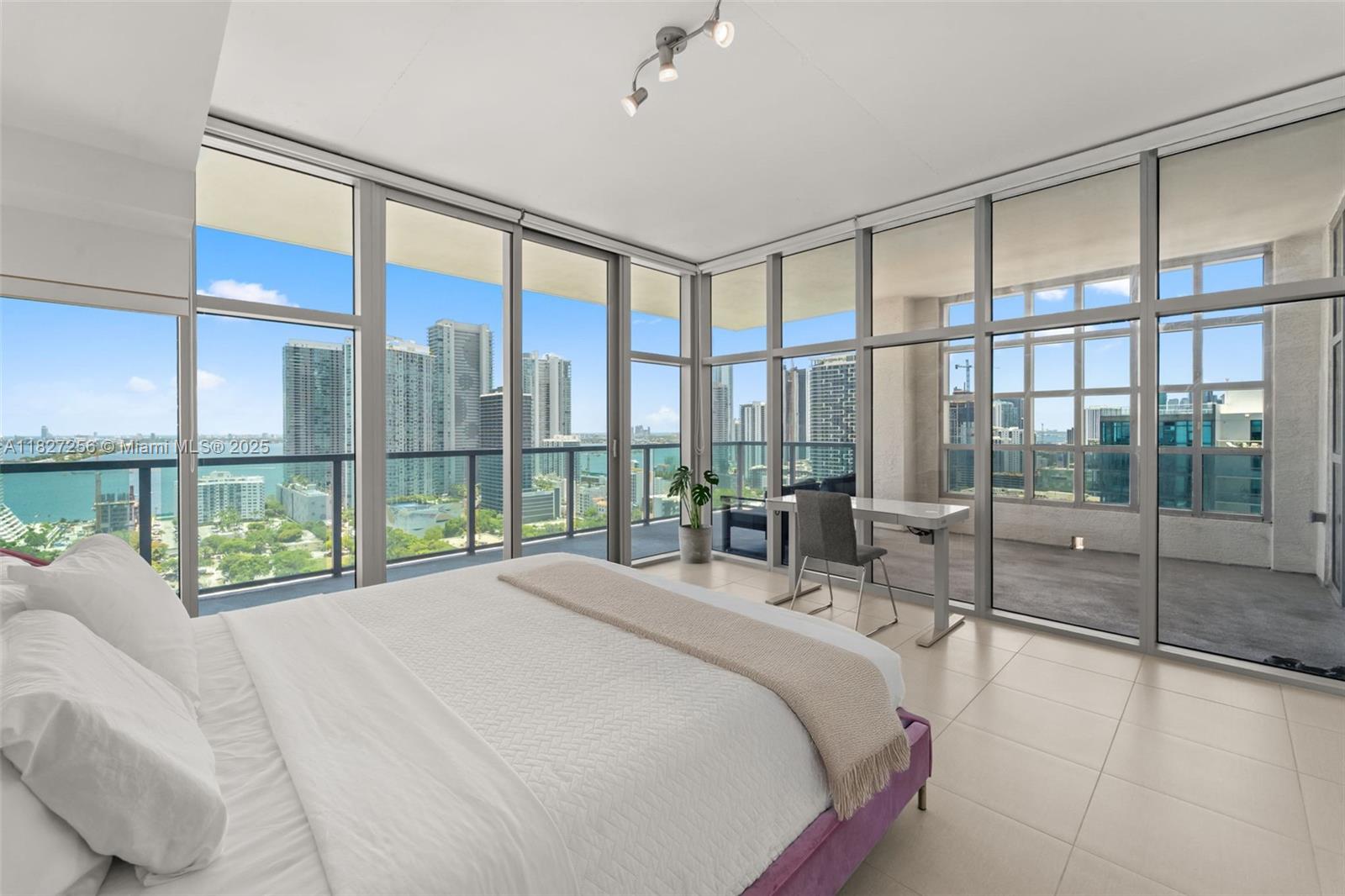 Renovated turnkey '12 line residence now available at Four Midtown. This expansive corner unit is the building's most coveted line, offering a spacious split floor plan with direct water views. A brand new kitchen with waterfall countertop is the perfect cooking perch with views of the Miami skyline and Biscayne Bay. The primary suite has been fully renovated with a custom walk-in closet that isn't standard on this floor plan. One of the most beloved elements of the '12 line is the balcony, which provides a wide covered section that acts as an indoor/outdoor retreat. Four Midtown was recently renovated with a new gym, pool and BBQ area. 24-hr security. Assigned parking. Midtown Miami is the NEW Miami, the most livable neighborhood just steps from Wynwood and the Design District.