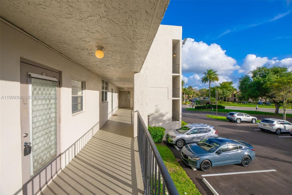 Photo of 9311 Orange Grove Dr #211, Davie, FL 33324 (MLS # A11999306)