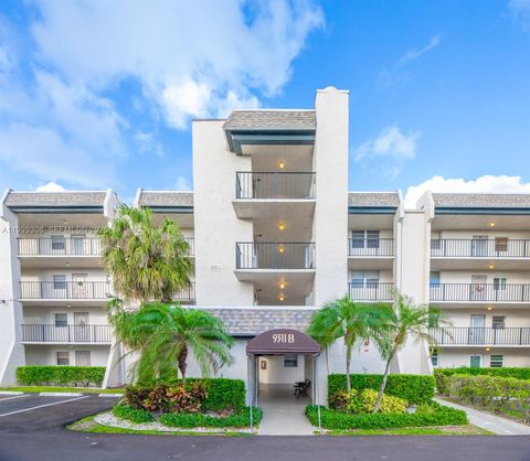 Photo of 9311 Orange Grove Dr #211, Davie, FL 33324 (MLS # A11999306)