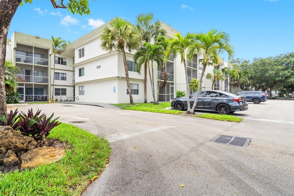 Photo of 4215 N University Dr #305, Sunrise, FL 33351 (MLS # A12042035)