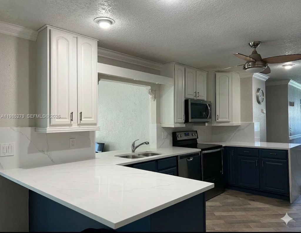 Photo of 633 NE 2nd St, Dania Beach, FL 33004 (MLS # A11985279)