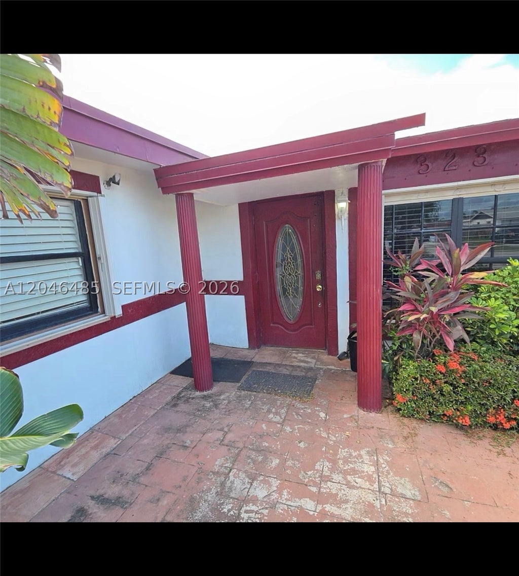 Photo of 323 NW 4th Pl, Deerfield Beach, FL 33441 (MLS # A12046485)