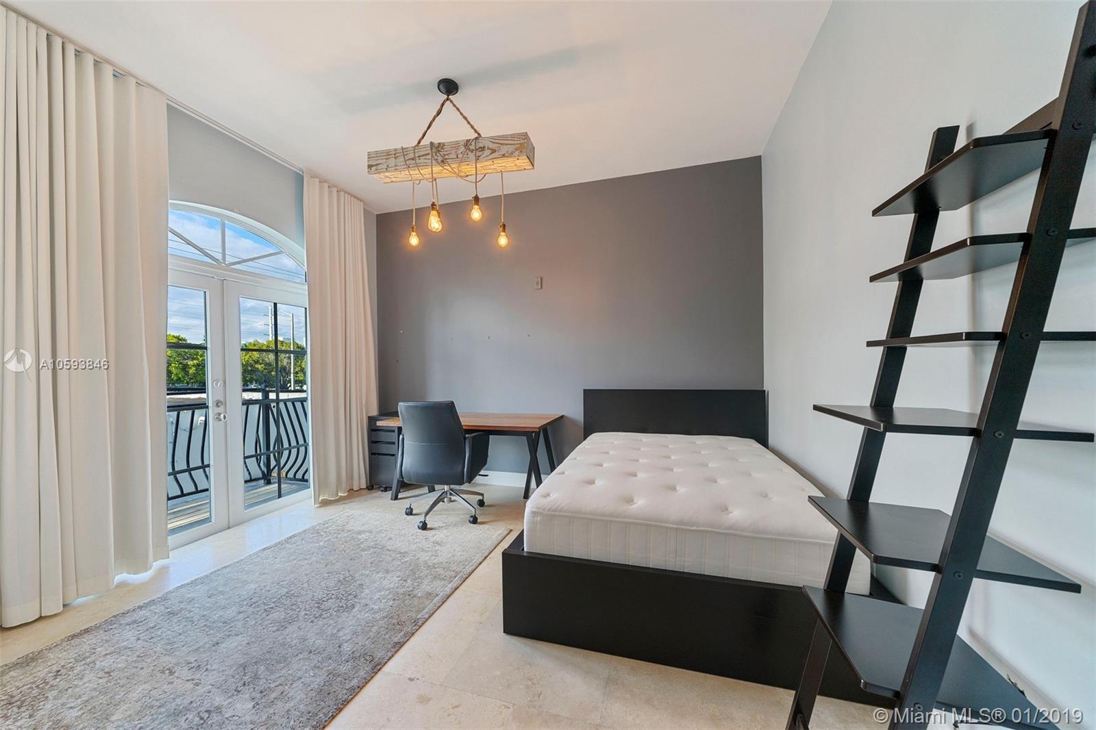 1121 MADRUGA AVE CONDO - Residential