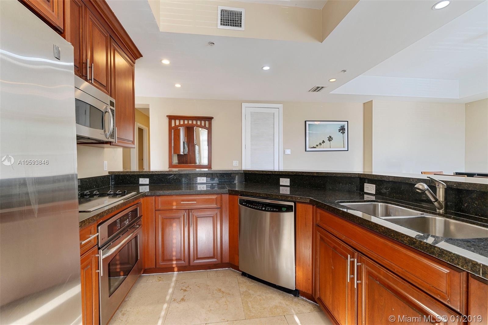 1121 MADRUGA AVE CONDO - Residential