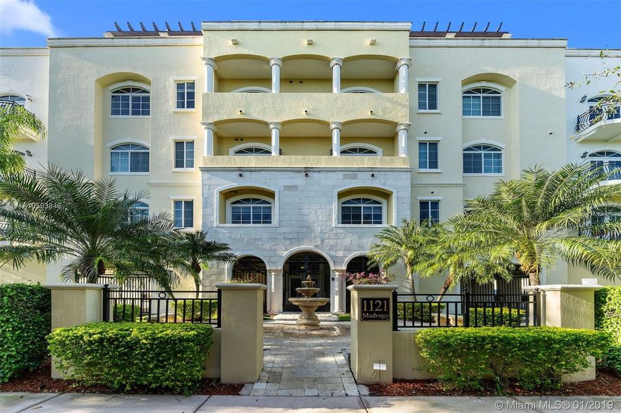 HUGE PRICE REDUCTION!!!  Don't miss this rare opportunity to live in a spacious 3/2.5 condo in a Coral Gables boutique building with 2 garage spaces.  Corner unit with beautiful marble floors and light pouring in from 3 exposures and 2 balconies make this a bright and comfortable home.  Open, gracious floor plan and high ceilings.  Large master includes a walk-in closet and huge bathroom with whirlpool tub, roomy separate shower, bidet, double sinks and lots of storage.  Built in 2007 featuring a rooftop pool, deck and BBQ area offering gorgeous views of Coral Gables and Downtown Miami with areas for sunset dining and sunrise yoga!  Walk to UM, Metrorail, restaurants and shopping.  Make an appointment now to see it before it's gone!