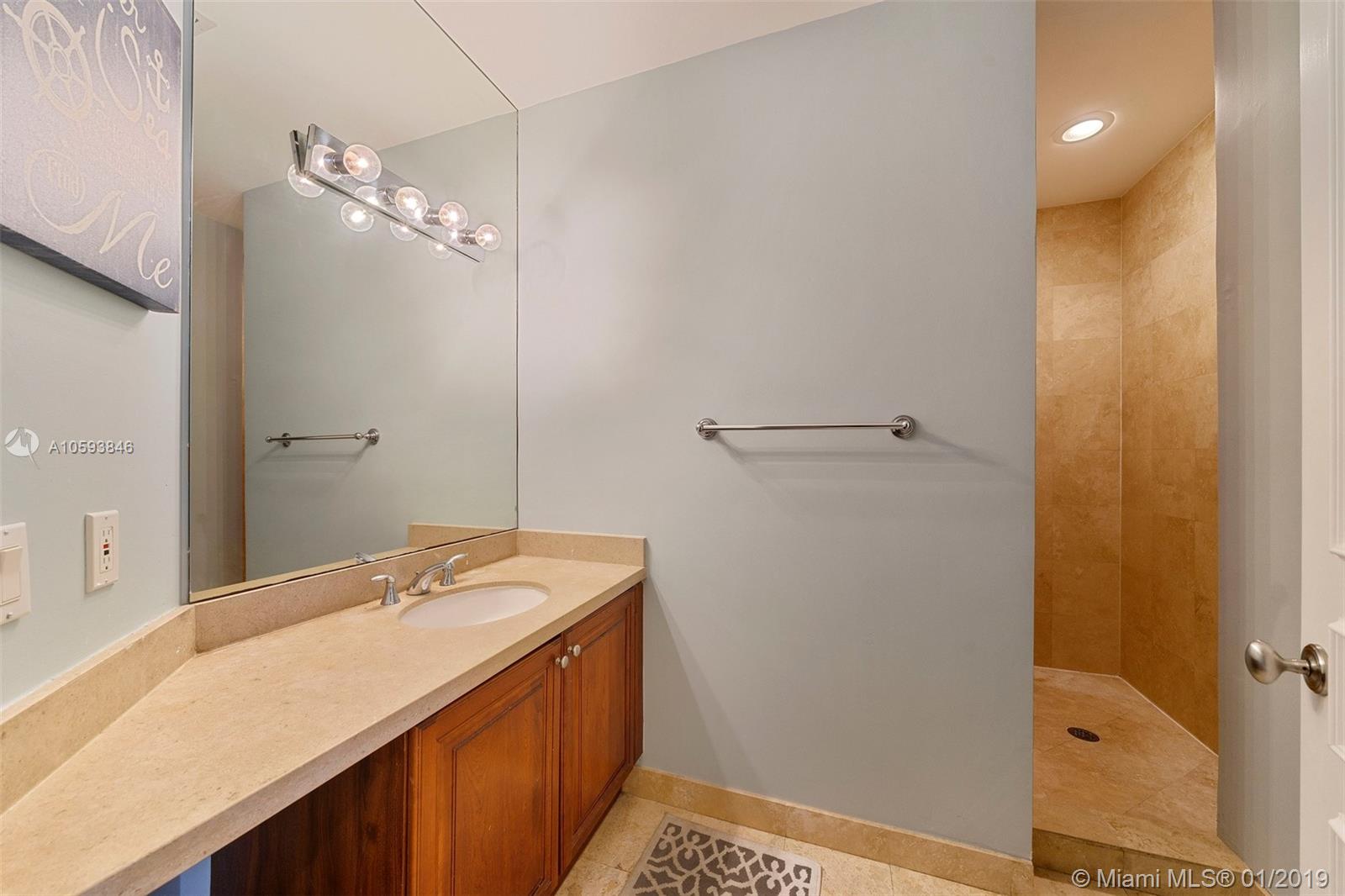 1121 MADRUGA AVE CONDO - Residential