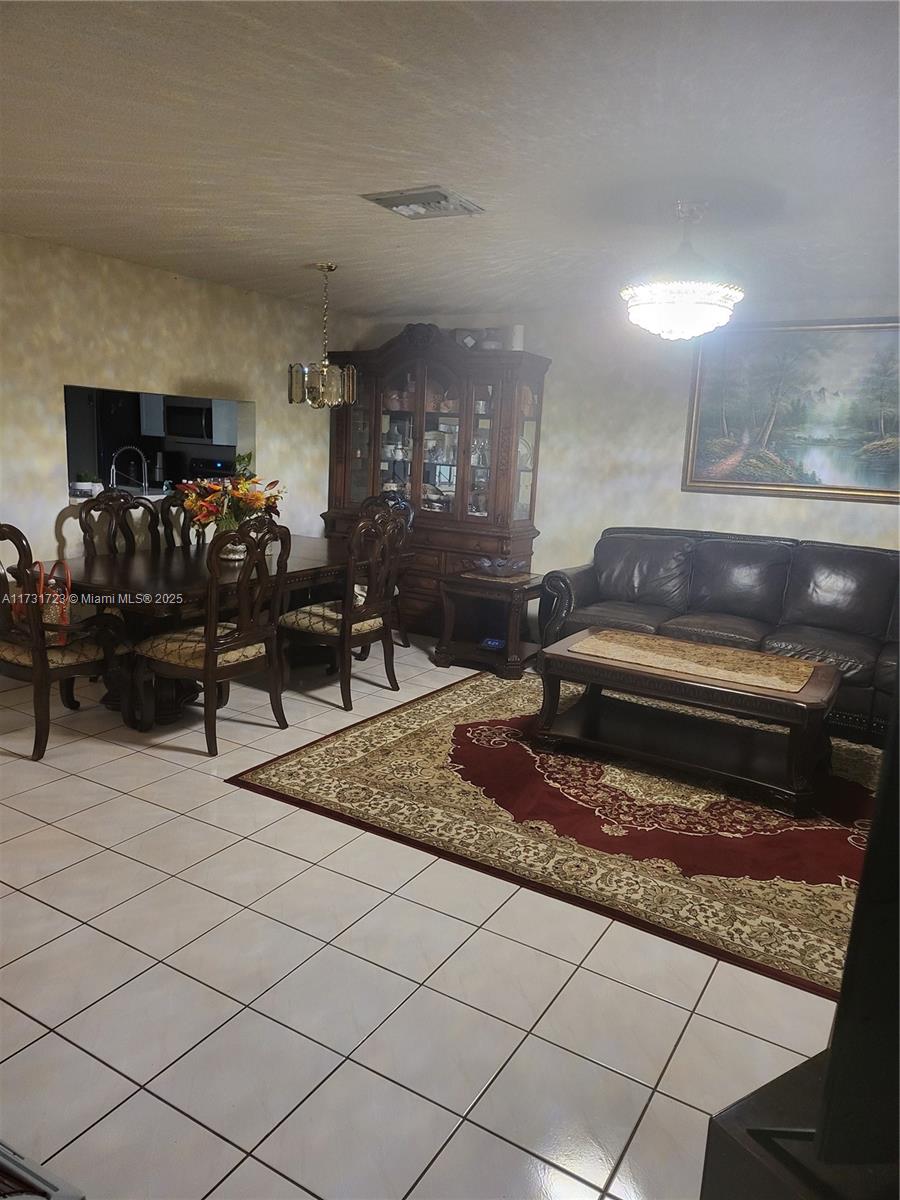 Property for Sale at 10877 Nw 8th St 10877, Pembroke Pines, Miami-Dade County, Florida - Bedrooms: 3 
Bathrooms: 3  - $479,000