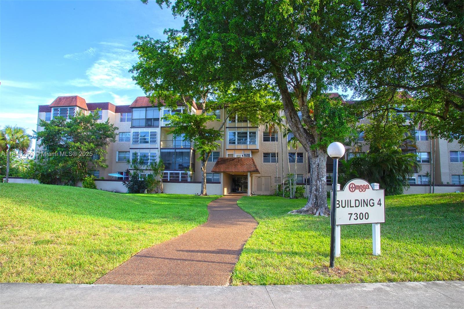 Spacious and elegant 1-bedroom, 1.5-bath condo in the desirable Omega IV community! This beautifully unit stands out for its generous layout: a large and independent living room plus a formal dining area - rare in units this size. The over sized bedroom includes a walk-in closet and two additional closets, offering abundant storage. The 1.5 bathrooms add extra comfort and functionality, perfect for guests and daily living. Enjoy peaceful mornings or relaxing evenings on your private balcony overlooking a lush green area, fully enclosed with windows. An additional storage unit is included in the building-ideal for seasonal items or personal belongings.