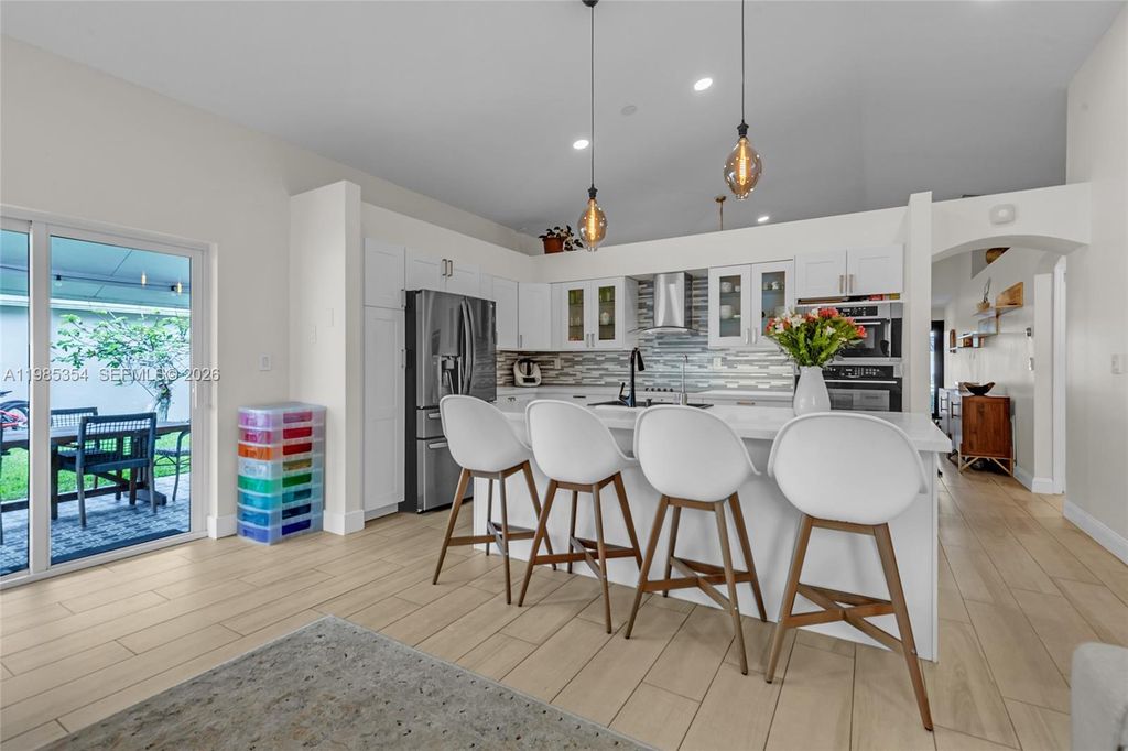 Photo of 12742 NW 11th Pl, Sunrise, FL 33323 (MLS # A11985354)