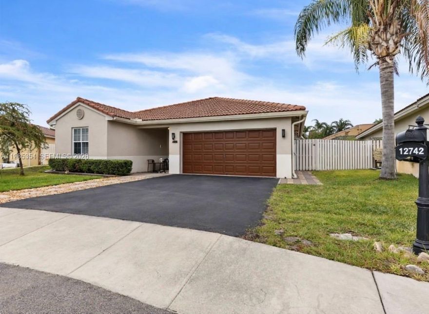 Beautifully updated 3BR/2BA home on a quiet cul-de-sac just minutes from Sawgrass Mills. Features include hurricane IMPACT WINDOWS, NEW APPLIANCES, and an UPDATED KITCHEN. Bright open layout with vaulted ceilings and wood-plank tile throughout. Enjoy a porch and private fenced backyard—perfect for entertaining. Spacious primary suite with walk-in closet and double vanity. 2-car garage and easy access to I-595, I-75, and Sawgrass Expressway.
Step inside to discover an open-concept layout with soaring vaulted ceilings and wood-plank tile flooring throughout, creating a bright and modern living space. The spacious living and dining areas flow seamlessly to a screened-in porch and private fenced backyard—perfect for relaxing or entertaining.
The open kitchen connects to the family room, making it ideal for everyday living and gatherings. The large primary suite offers a walk-in closet and an updated en-suite bathroom with double vanities and a spacious shower.
Additional highlights include a 2-car garage, fresh interior paint, and a prime location. ROOF 2007, AC 2010, WH 2025, Smart Home items like WIFI SPRINKLER SYSTEM, NEST and GOOGLE Door Bell, BUILD-IN closets, Dryer BOOSTER FAN, REVERSE OSMOSIS WATER System. 
Don’t miss this exceptional opportunity to own a turnkey home in a highly convenient and desirable location!
Watch the 3D tour!