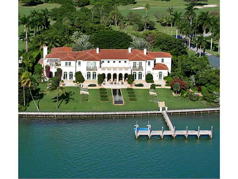 Classic Italian Mediterranean Estate on wide open Biscayne Bay, Spectacular Sunsets and Miami Skyline Views! Located on Private Exclusive Indian Creek Island w/ 24hr Police, 18 Hole Championship Golf Course, moments to BH Shops. Built 2002 this home is a graceful combination of groin vaulted ceilings, Corinthian columns, large terraces, fireplaces, wine room, summer kitchen, gym, large his/hers closets. 4-Car gar, 255' open bay w/ large concrete dock & lifts. One of a kind estate!