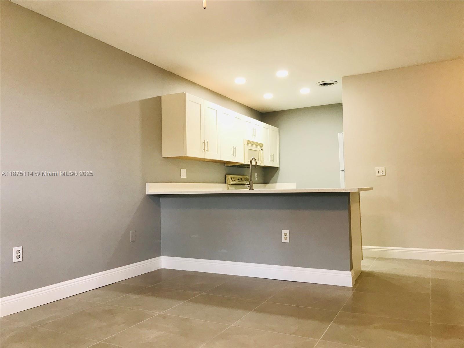 Beautiful Lake View! Remodeled 2 bed 2 bath apartment located in Pembroke Pines. Close to everything. Quartz counter top. Freshly painted entire place. Complex has a community pool, assigned parking with plenty of guest parking spaces. Fast association approvals.
