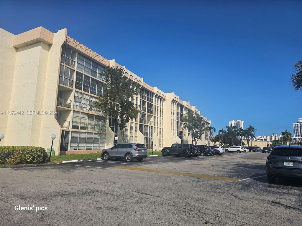 Photo of 801 Three Islands Blvd #218, Hallandale Beach, FL 33009 (MLS # A11972442)