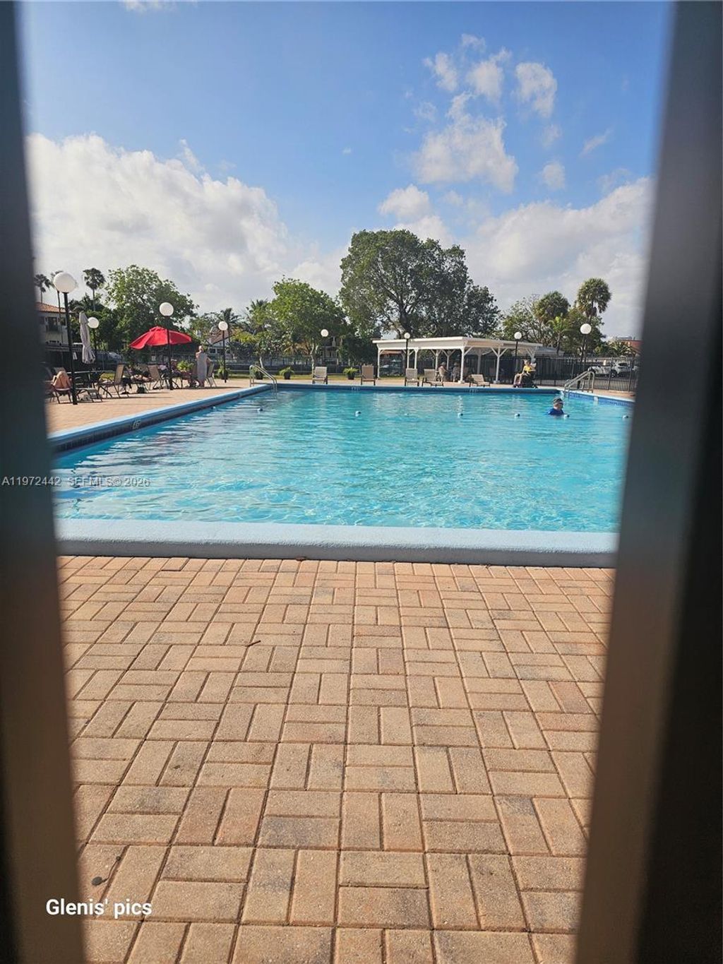 Photo of 801 Three Islands Blvd #218, Hallandale Beach, FL 33009 (MLS # A11972442)