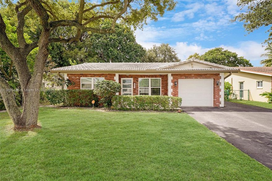 Charming 3 bedroom, 2 bathroom water front home ready for you to make your own! Welcoming curb appeal and located in the quiet, family friendly neighborhood of Palm Aire Village. Offers amazing living space, wonderfully updated kitchen with stainless steel appliances, IMPACT WINDOWS & DOORS, Newer AC,  1-car garage and plenty of space for additional parking for RV or boat, recently updated bathrooms, and a wonderfully peaceful backyard with calming water views! Conveniently located close to major highways, shopping, dining, parks and so much to do! Only 10 miles to Downtown Ft Lauderdale and beaches. 7 miles to Ft. Lauderdale International Airport. *This home will be ready for you with a BRAND NEW ROOF* Don't let this grand opportunity pass you by, schedule your showing today!