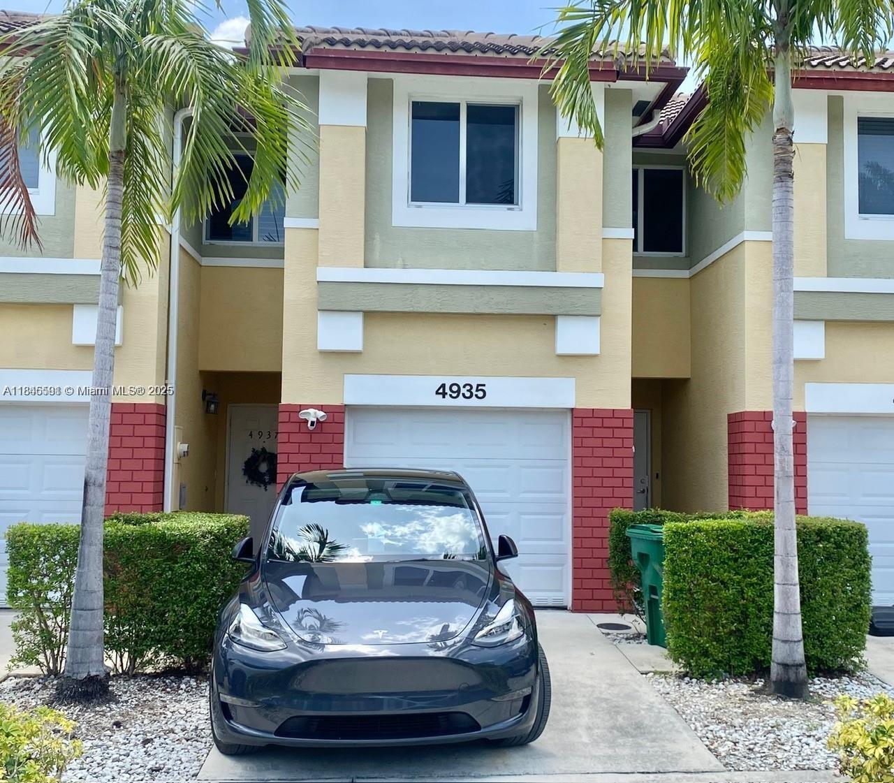 Enjoy comfortable living in this updated 3-bedroom, 2.5-bath townhouse. Built in 2014, this home features tile floors downstairs and laminate floors upstairs, hurricane-proof windows, a washer and dryer, a one-car garage, EV charger ready, and a screened-in patio overlooking a quiet canal. Located in the heart of Downtown Davie, the center of Broward County, you’ll benefit from quick access to local shops, dining, parks, and excellent schools.
