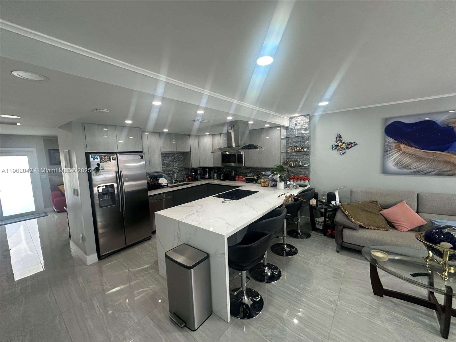 OCEAN ACCESS!!! UNIT CURRENTLY UNDER REMODELING to 3 BDR/3 BATH + OFFICE. EASTERN SHORES WATERFRONT TOWNHOME WITH DOCK. CORNER UNIT - NEXT DOOR TO THE POOL. WALKING DISTANCE SHOPPING PLAZA, OLETA PARK - AND BEACH!