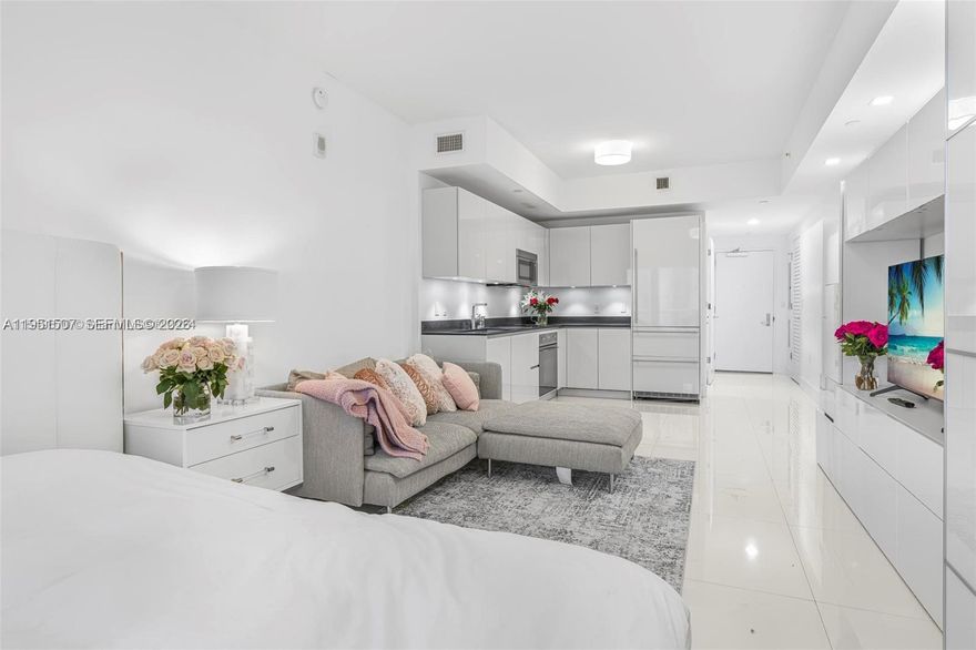 Experience the ultimate Brickell luxury lifestyle in this spectacular upgraded and fully furnished studio at the iconic 1010 Brickell Condo. Designed for modern living, this residence features 9-foot ceilings, elegant stone-like porcelain tile flooring, a stylish open-concept layout, ample closet space, offering both comfort and sophistication.Enjoy resort-style amenities unlike any other in Miami. Entertain and relax at the 50th-floor rooftop, featuring a movie theater, café, BBQ area, lounge, and swimming pool with breathtaking city views. Additional amenities include  an indoor heated pool, gym,  24-hour valet and security ,a fully equipped party room, business center, and an exceptional kids’ area with bowling, ping pong, and interactive games. Unit comes with 1 unassigned parking spot with free valet.

Ideally located just steps from Brickell City Centre, Mary Brickell Village, and some of Miami’s best restaurants and hotspots, including Sexy Fish and Mister 01, as well as shops, bars, and vibrant nightlife.
This is your opportunity to enjoy luxury, comfort, and an unbeatable lifestyle in the heart of Brickell!