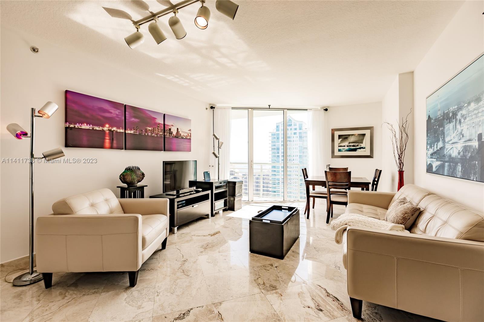 Great opportunity to live in the desirable "17" Line with the best ocean views in Downtown Miami! Unit is tastefully furnished (elegant yet cozy) with beautiful marble floors throughout. It is impeccably maintained and equipped with everything you need. Only bring your personal belongings. Assigned parking for 1 vehicle inside the garage. No pets. One Miami is a secure place to live with access to metro mover directly across the street and the many comforts of Downtown living, while still set off from the street. Come see.