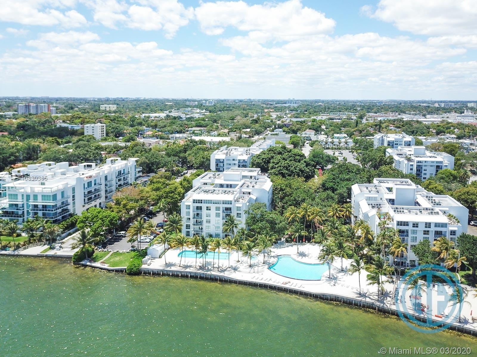 Live where you vacation. This one of a kind gated resort style community which includes a man made beach area with BBQ, beach volley, hammocks, SUP/Kayak storage, infinity pool, lap pool, hot tub, state of the art gym, lush landscape, laundry and Bistro. Spacious 1 BR, Updated bathroom with separate 2 sink cabinet. Brand new bedroom floors and custom cabinetry in large walk in closet. Kitchen with stainless steel appliances and granite countertop. Nice & spacious terrace. Lots of storage. Rent includes 2 parking spaces, water and sewer. Pets welcome (some restrictions apply) with Pet deposit. Click on Virtual Tour link for video of amenities.