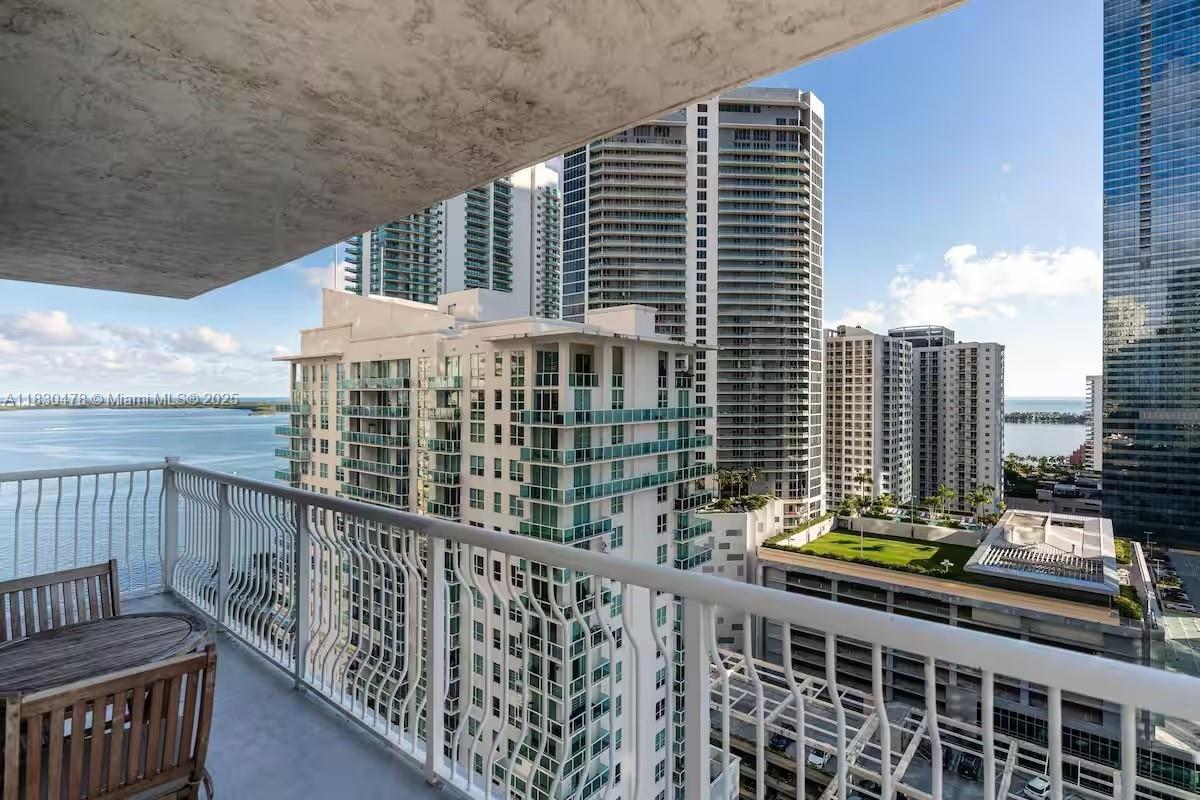 Turnkey Corner Unit with Stunning Ocean & City Views | NO RENTAL RESTRICTION. Step into this beautifull 2 Bed / 2 Bath + DEN corner unit in The Club at Brickell Bay, where panoramic oceanfront and skyline views meet stylish modern living. Enjoy a wrap-around balcony with over 300 sqft of outdoor space, perfect for entertaining or unwinding above the city.
This residence features wood floors throughout, a smart and functional layout, and is being sold fully furnished with curated art and designer pieces – truly move-in ready. Ideal as a primary residence, second home, or income-generating Airbnb. Just steps from Brickell’s top restaurants, shops, nightlife. This is one of the few buildings in Brickell with full Airbnb flexibility – a true investor’s dream.