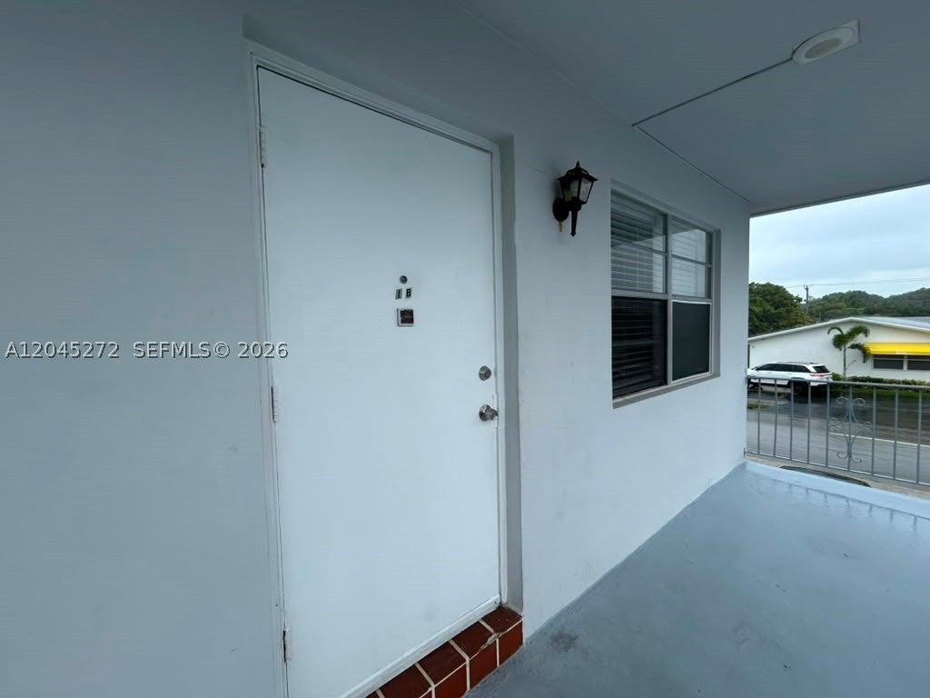 Photo of 2435 Van Buren St #APT 1B, Hollywood, FL 33020 (MLS # A12045272)