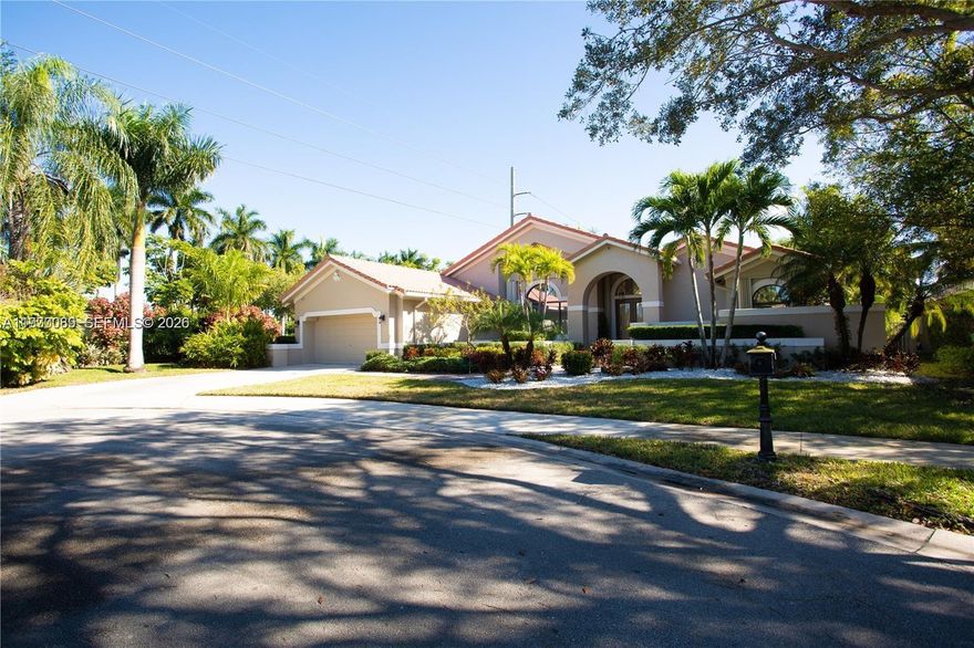 Beautiful and elegant 4-bedroom, 3-bathroom home located in the peaceful and highly desirable community of Tequesta Point in Weston. Almost 16,000 SF cul-de-sac lot with extra parking spaces. This bright and spacious residence features an open-concept layout filled with natural light. Floor-to-ceiling windows provide stunning views of the pool surrounded by palm trees, visible from the main living areas and the primary bedroom.
Recently remodeled, the home showcases modern bathrooms and an updated kitchen with quartz countertops. The primary suite includes a large, custom-finished walk-in closet, offering plenty of space to stay organized.
Additional features include washer and dryer, security cameras, and a burglar alarm system. Four parking spaces. Soaring ceilings. Customized closets. The gated community offers 24-hour security at the entrance for added peace of mind.
Excellent location with easy access to I-75 and I-595, and just minutes from restaurants, supermarkets, pharmacies, Town Center, and parks. A charming park located next to the community entrance provides the perfect place to walk and enjoy time with your children. 
Weston is known for its safety, family focus, master-planned design, strong schools, clean neighborhoods, and outdoor lifestyle.