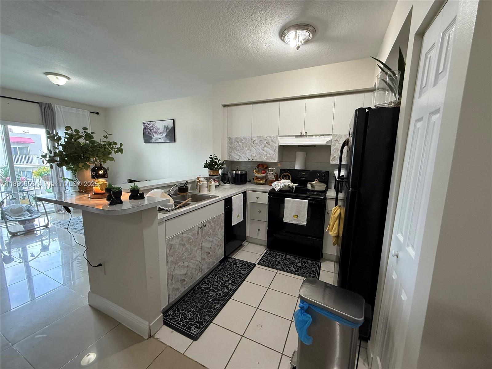 Investors welcome! Spacious 2 bed, 2 bath condo in great community! Unit is currently rented out and has great tenants. The complex has a guarded gate and FOB building entrance. Community amenities include tennis courts, pool, and great washing machines area and dryers (unit has washer/dryer in unit as well). Condo is well maintained with has a great association. NEW AC!